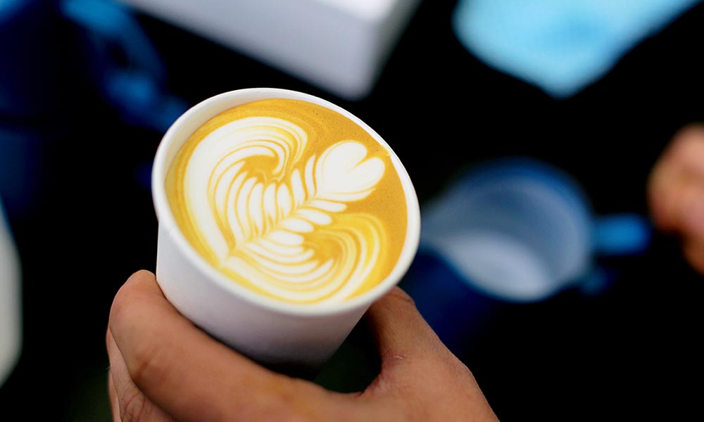 Pouring a flat white